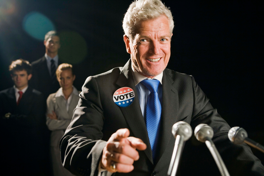 Politician with microphones